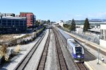 Caltrans owned Charger # 2105 pushes Amtrak Train # 536 out of Emeryville Station